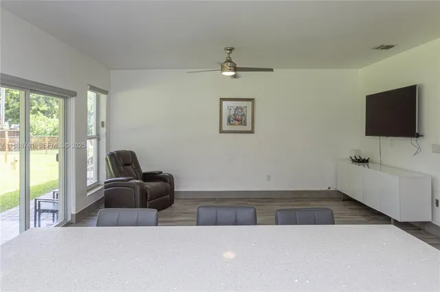 a living room with furniture and a table