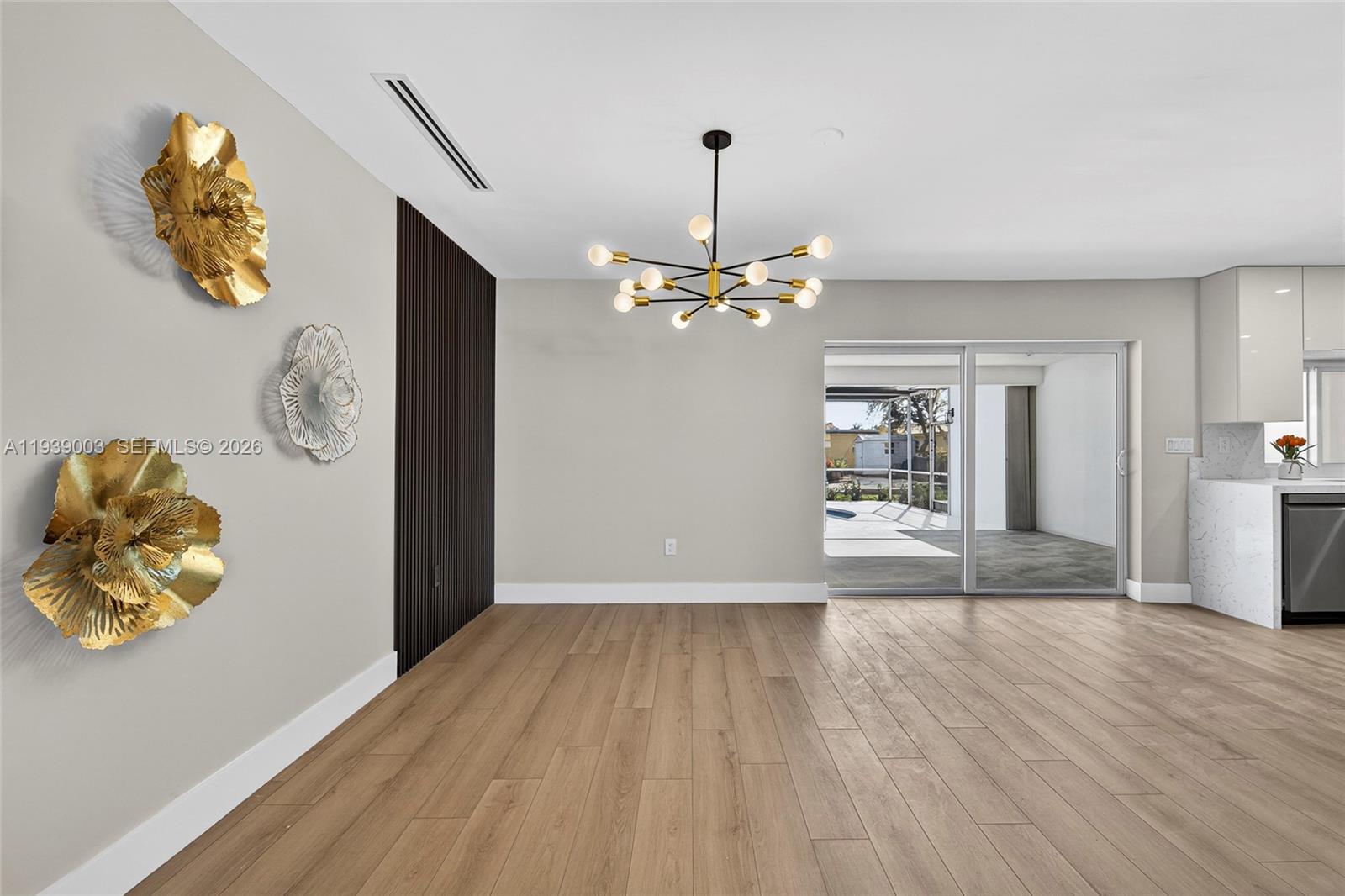 4712 Cleveland Street Hollywood, FL 33021 - Photo 11 of 49 a view of an entryway with wooden floor