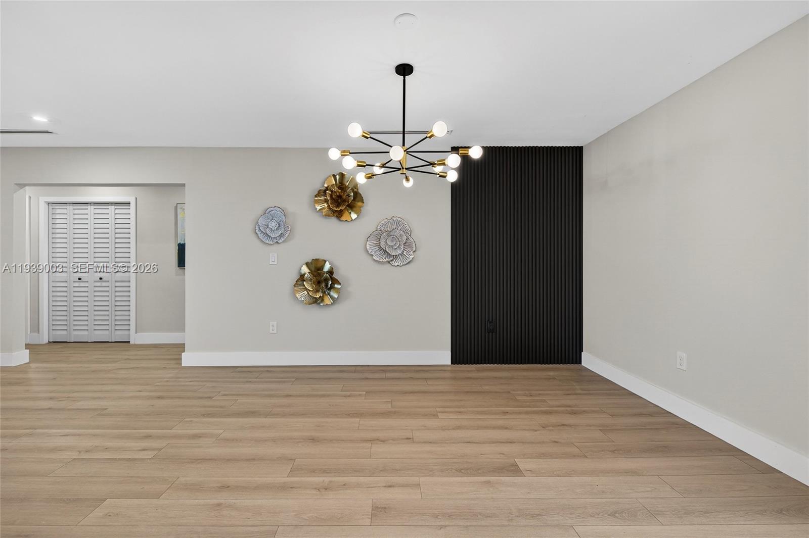 4712 Cleveland Street Hollywood, FL 33021 - Photo 13 of 49 a view of a livingroom with wooden floor