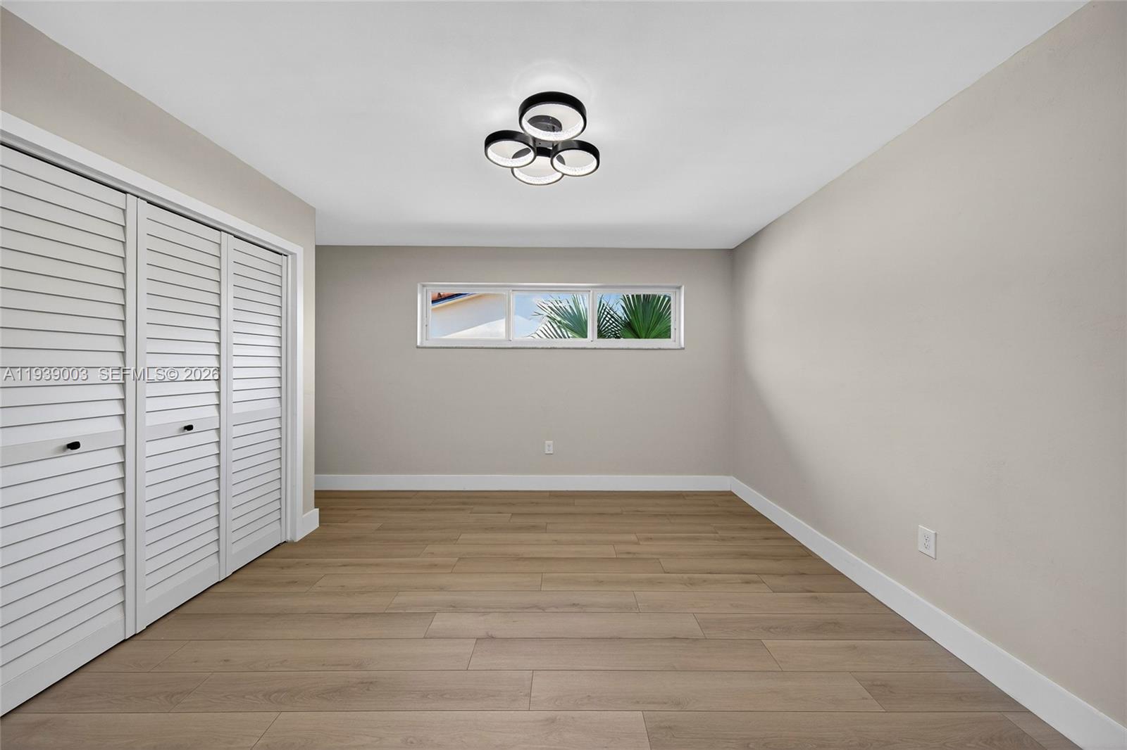 4712 Cleveland Street Hollywood, FL 33021 - Photo 26 of 49 an empty room with windows