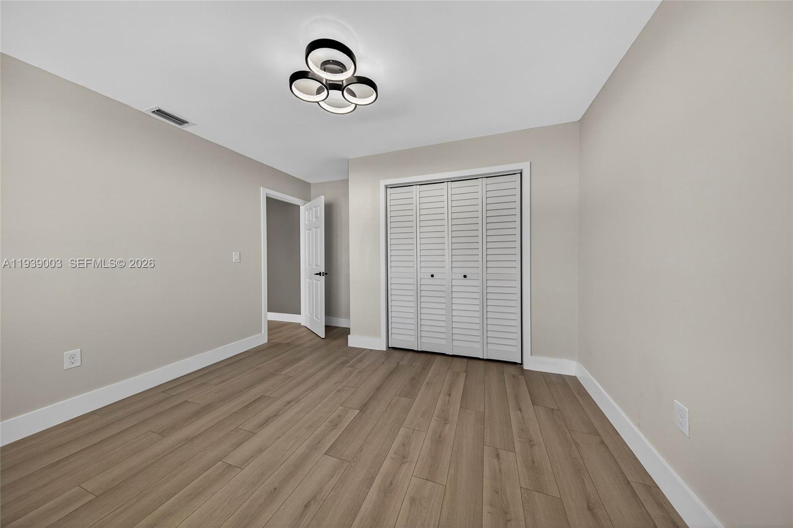 4712 Cleveland Street Hollywood, FL 33021 - Photo 33 of 49 a view of a room with wooden floor