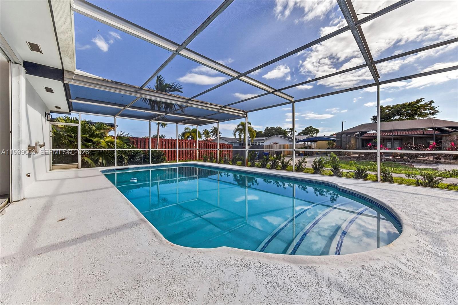 4712 Cleveland Street Hollywood, FL 33021 - Photo 40 of 49 a view of a swimming pool