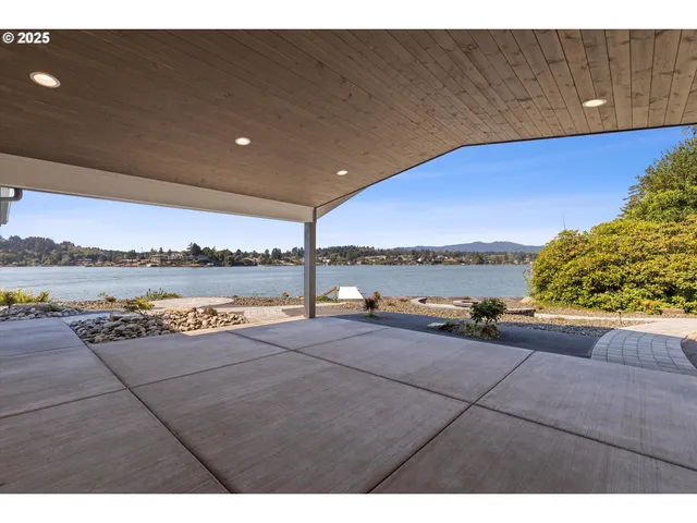a view of a room and an entryway