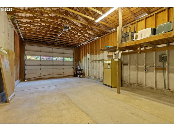 a view of a garage with wooden wall
