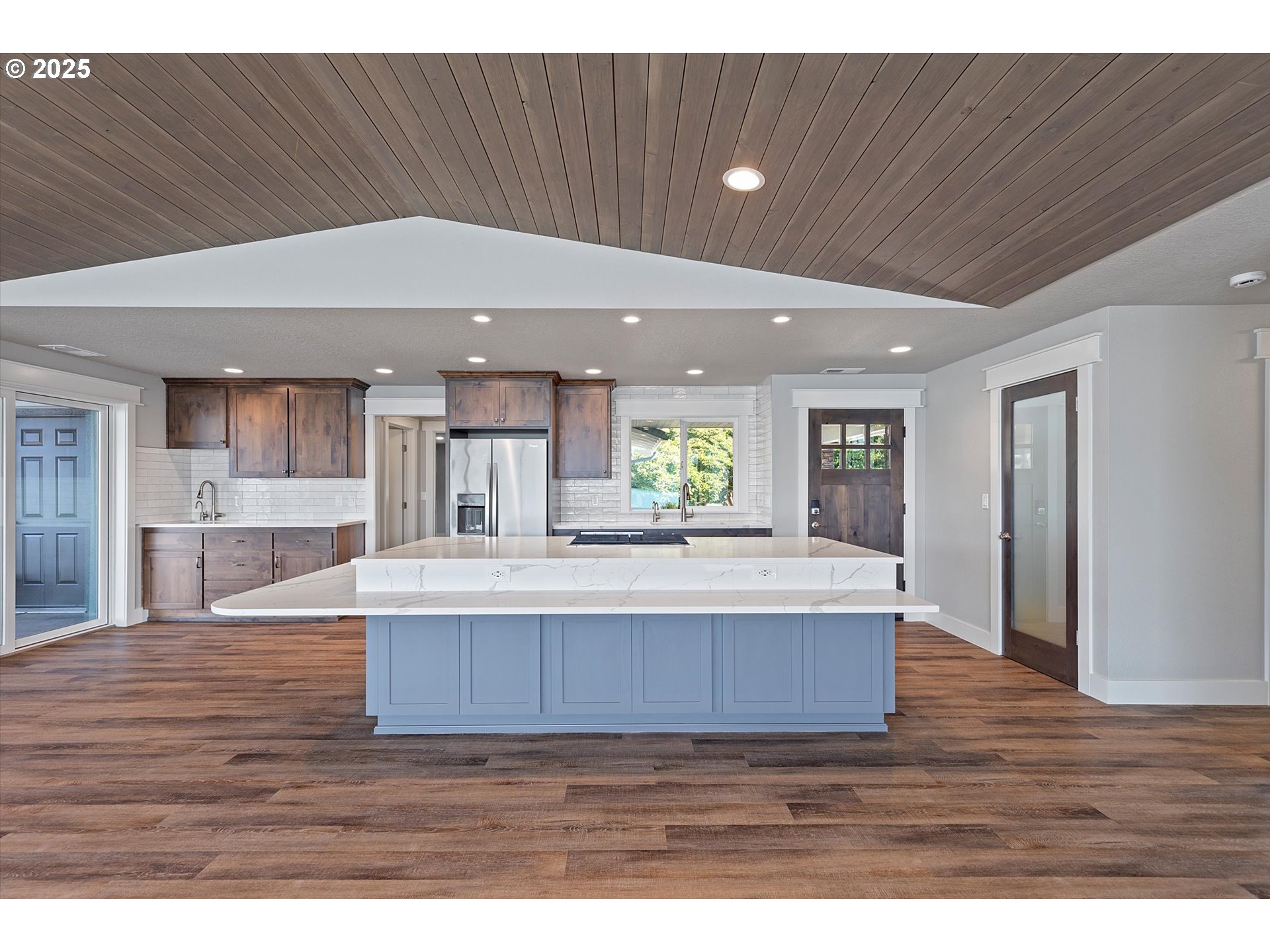 2997 Northeast Loop Drive Otis, OR 97368 - Photo 5 of 35 a view of kitchen with cabinets and wooden floor
