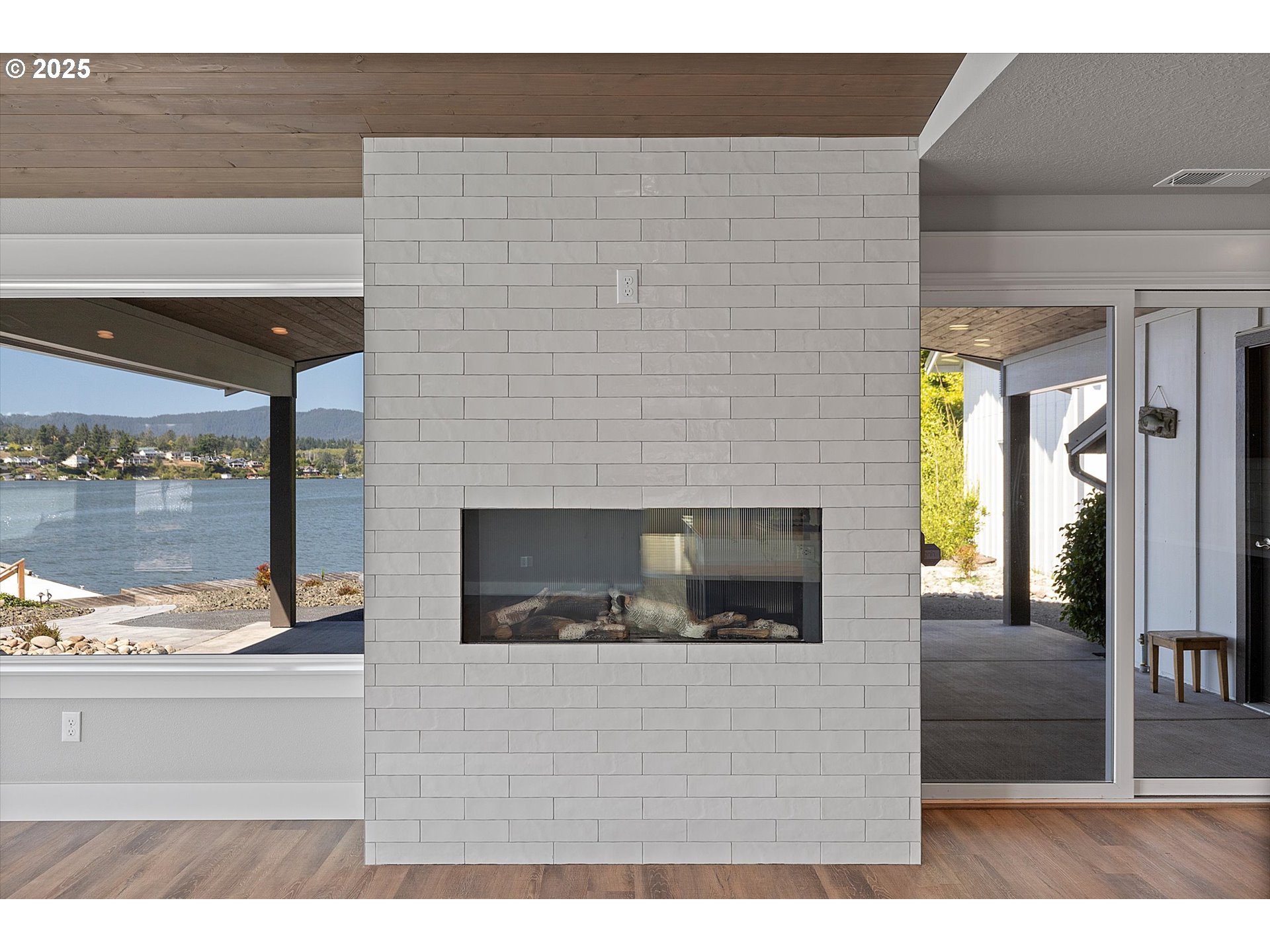 2997 Northeast Loop Drive Otis, OR 97368 - Photo 7 of 35 a living room with furniture and a fireplace