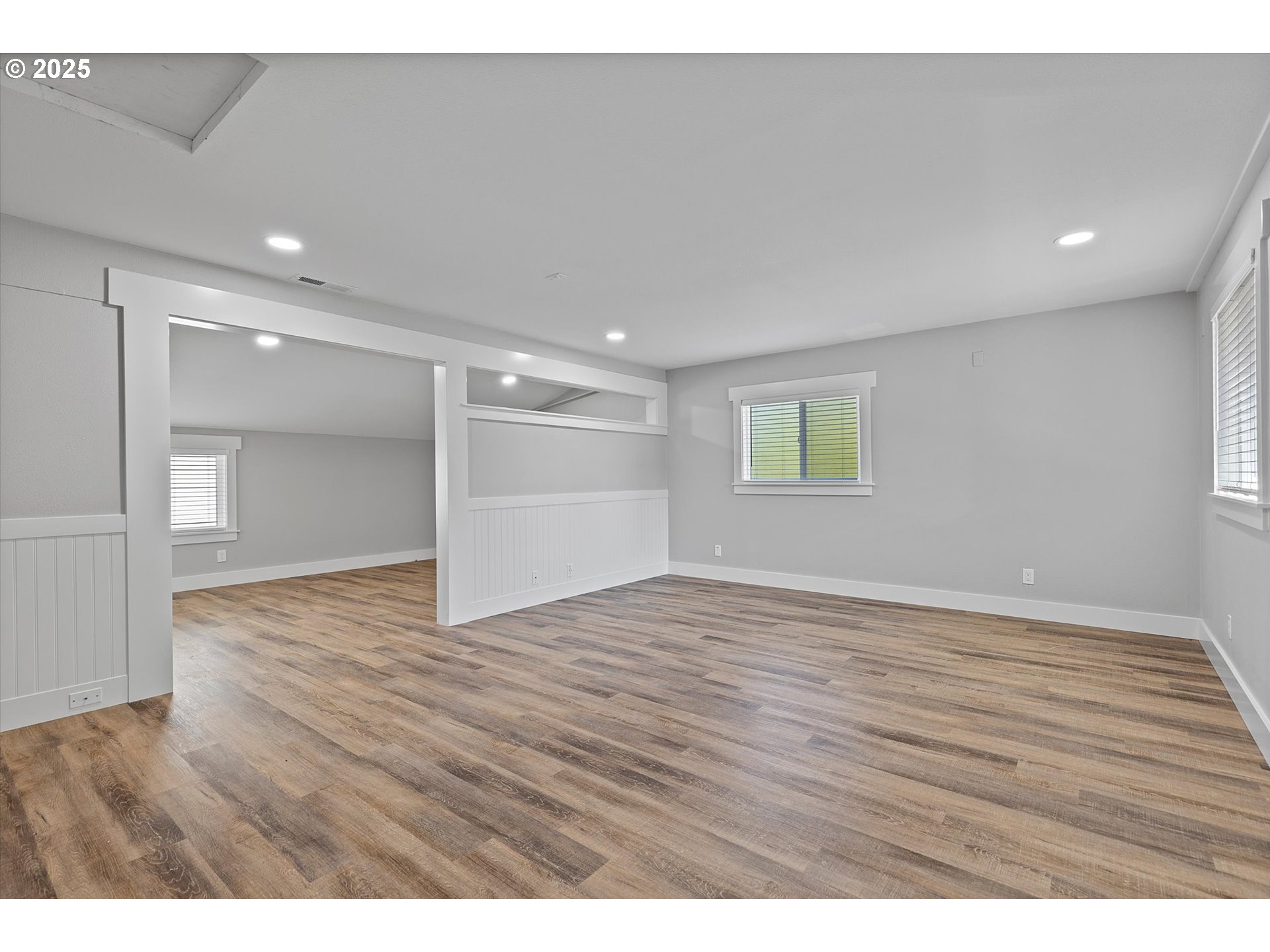 2997 Northeast Loop Drive Otis, OR 97368 - Photo 10 of 35 a view of an empty room with wooden floor and a window