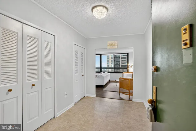 a view of a dining room with furniture and window