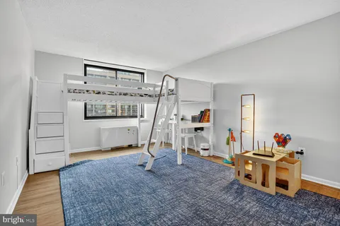 a view of a livingroom with furniture and front door