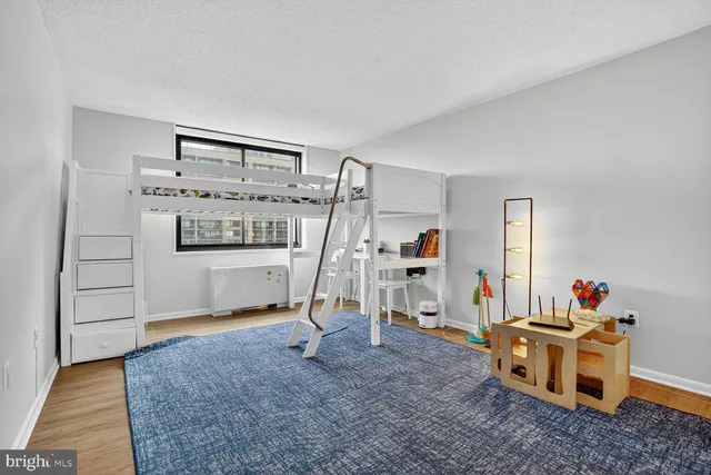 a view of a livingroom with furniture and front door