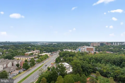 a view of parking garage with cars