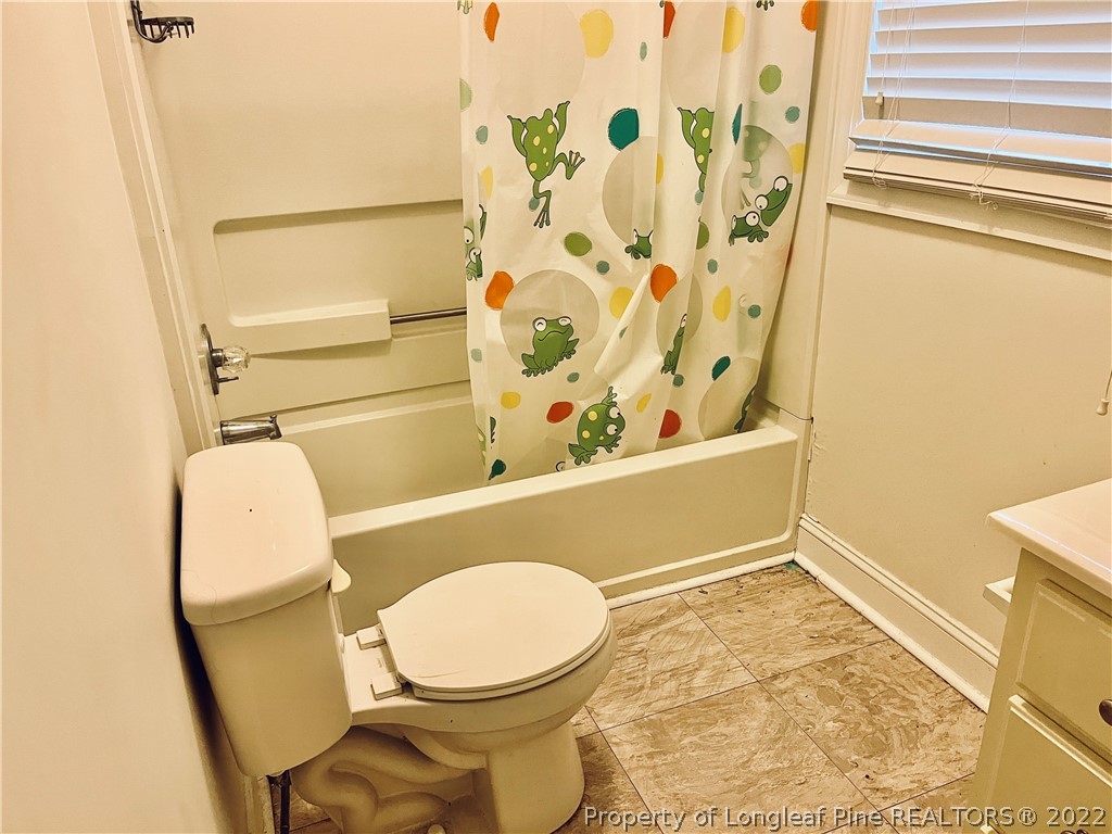 3140 Wade-Stedman Road Stedman, NC 28391 - Photo 20 of 36 a bathroom with a toilet and a shower