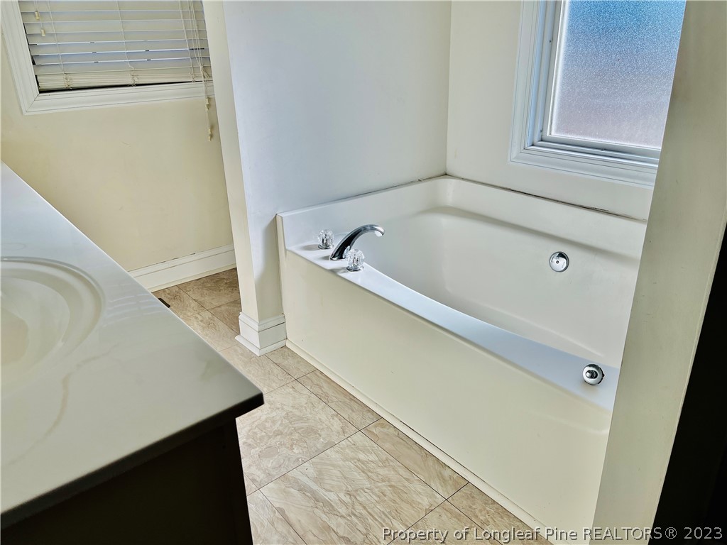 3140 Wade-Stedman Road Stedman, NC 28391 - Photo 36 of 36 a bathroom with a bathtub