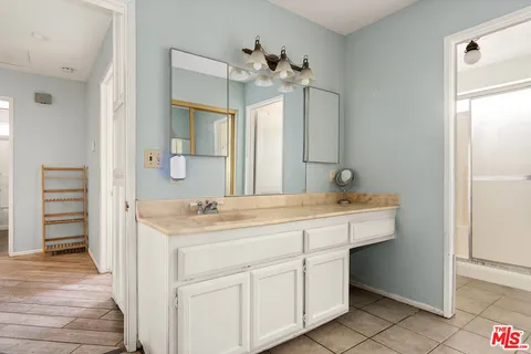 a bathroom with a shower and a toilet