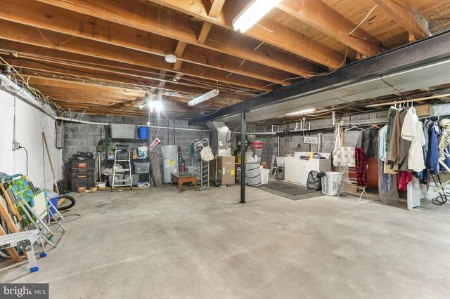 a view of a storage room with gym equipment