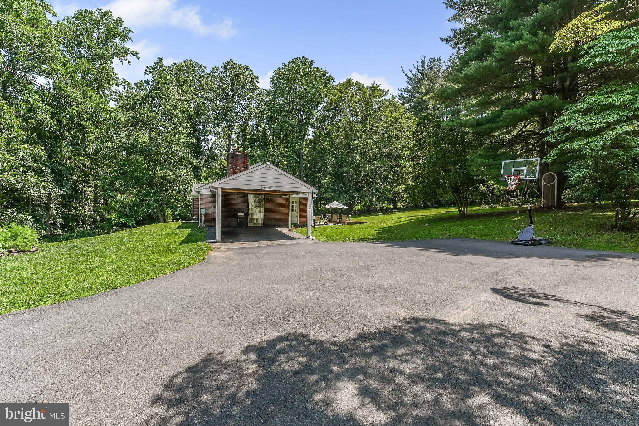 430 West Rose Tree Road Media, PA 19063 - Photo 3 of 31 a front view of a house with garden