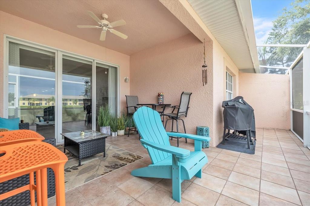 1260 Rio De Janeiro Avenue, Unit 102 Punta Gorda, FL 33983 - Photo 34 of 46 a living room with furniture a window and a table