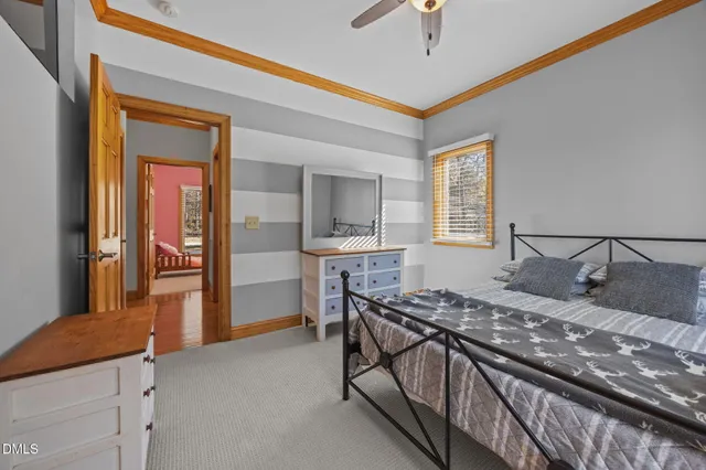 a bedroom with a bed and a table in it