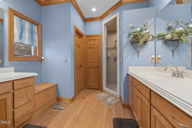 a bathroom with a sink a vanity and a mirror