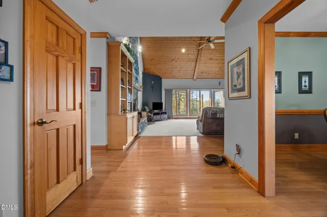 a view of a living room with furniture and a view of bathroom