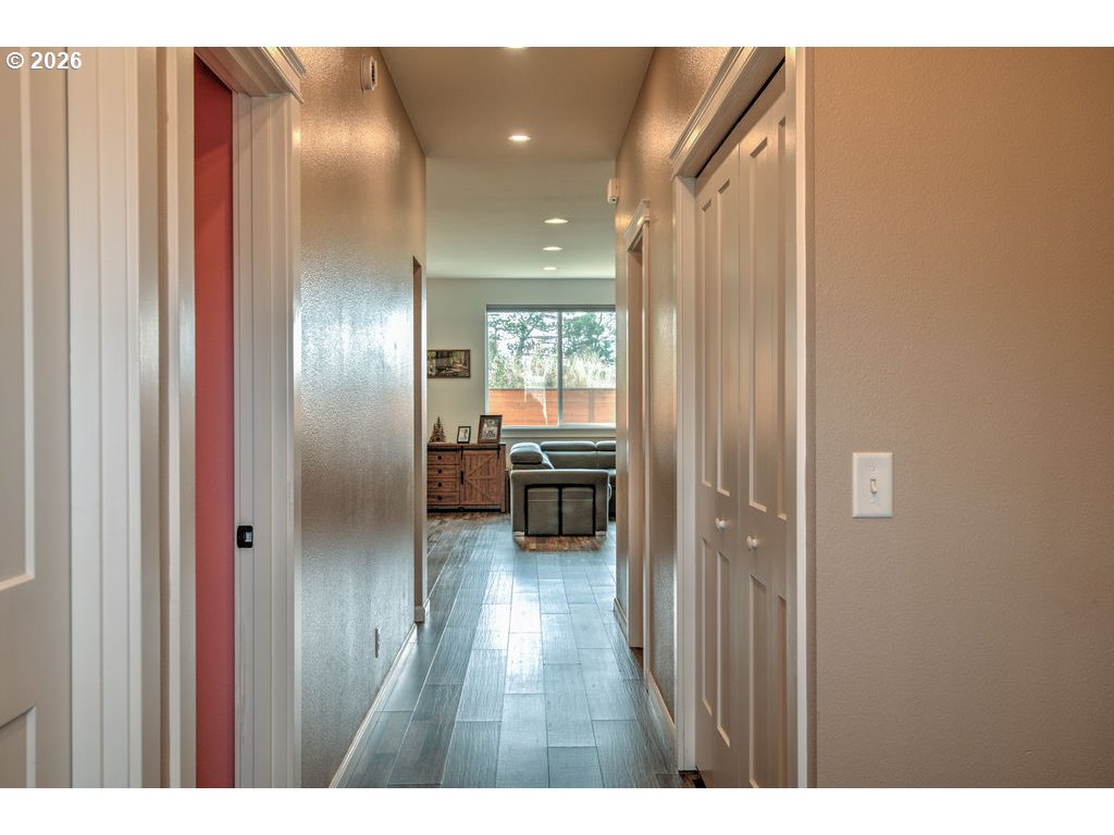 1966 34th Street Florence, OR 97439 - Photo 9 of 17 a view of a kitchen from the hallway