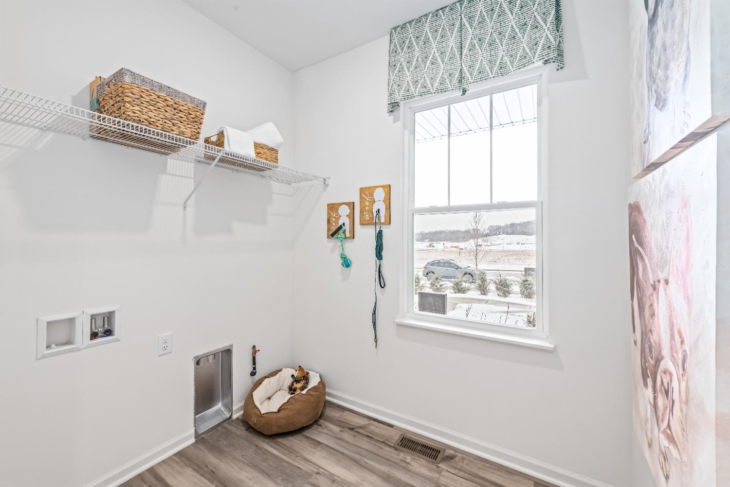 8553 Graystone Drive Lowell, IN 46356 - Photo 22 of 27 a view of dining room with wooden floor and windows