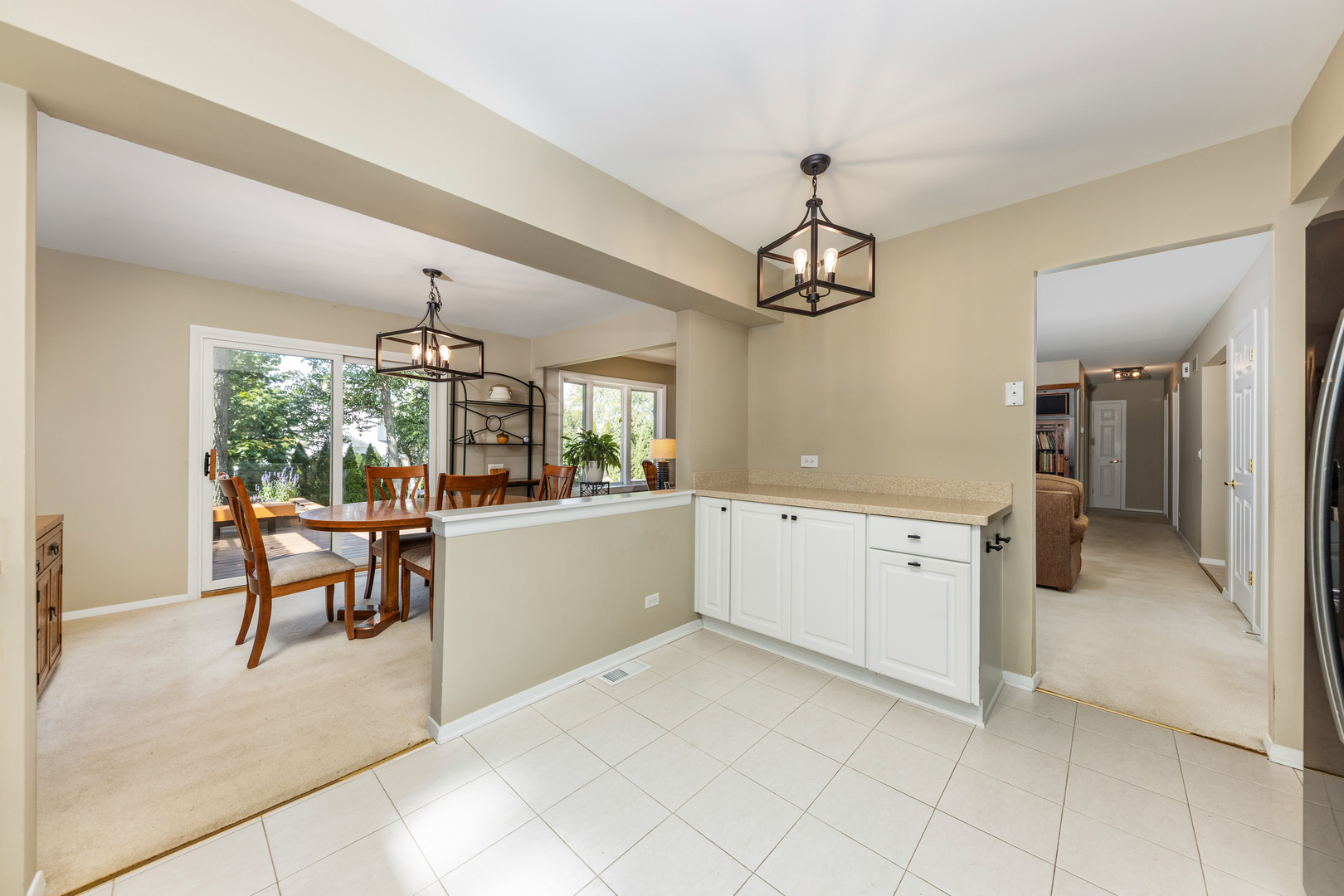 1505 Ranchview Drive Naperville, IL 60565 - Photo 15 of 36 a view of a kitchen and dining room