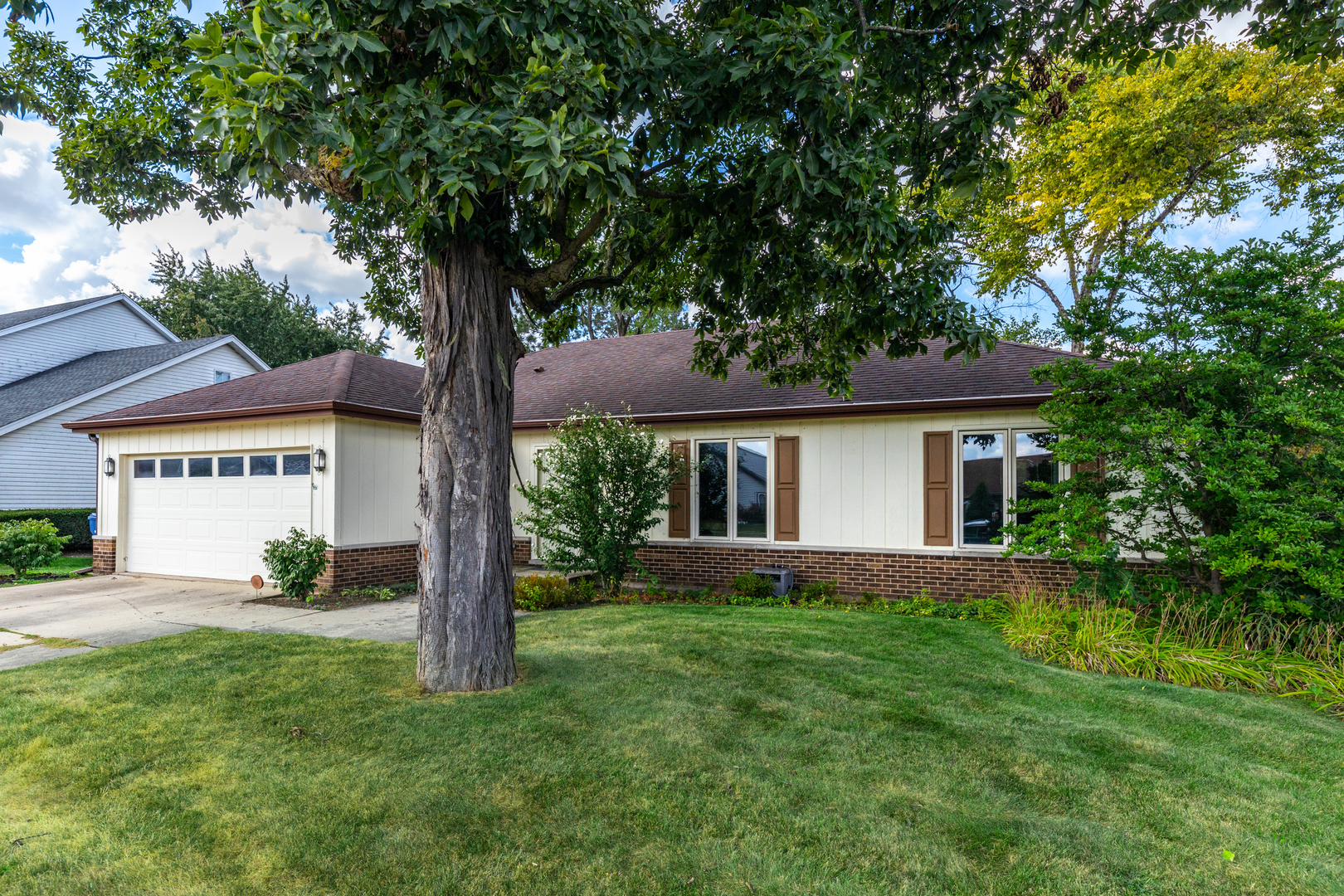 1505 Ranchview Drive Naperville, IL 60565 - Photo 2 of 36 a front view of house with yard and green space