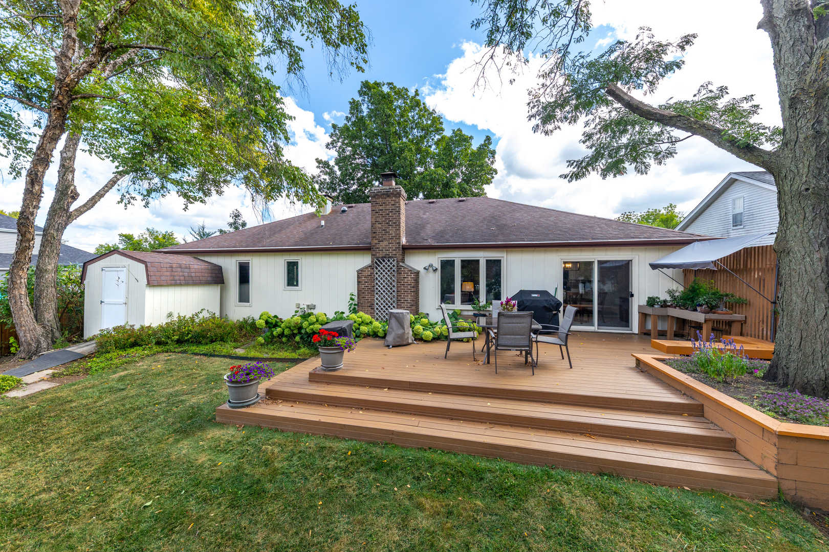 1505 Ranchview Drive Naperville, IL 60565 - Photo 3 of 36 a front view of house with yard and outdoor seating