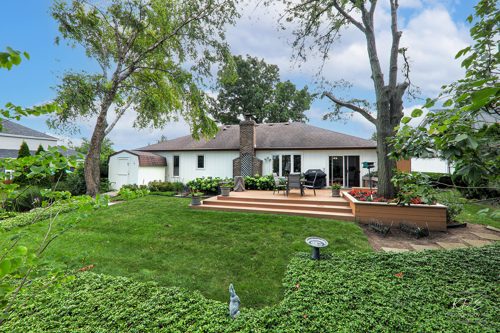 1505 Ranchview Drive Naperville, IL 60565 - Photo 5 of 36 a front view of a house with swing and garden
