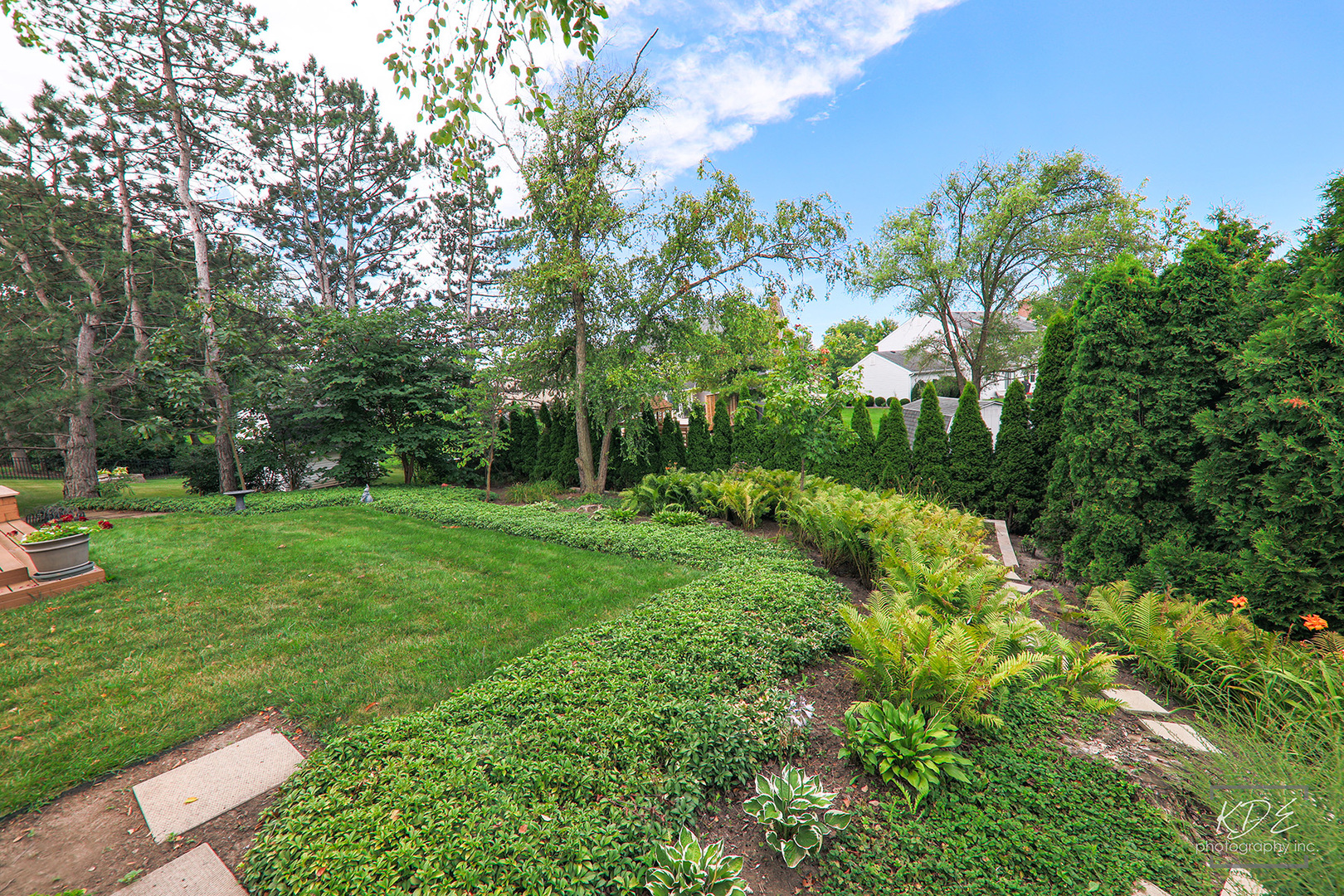 1505 Ranchview Drive Naperville, IL 60565 - Photo 7 of 36 a view of a garden with a tree