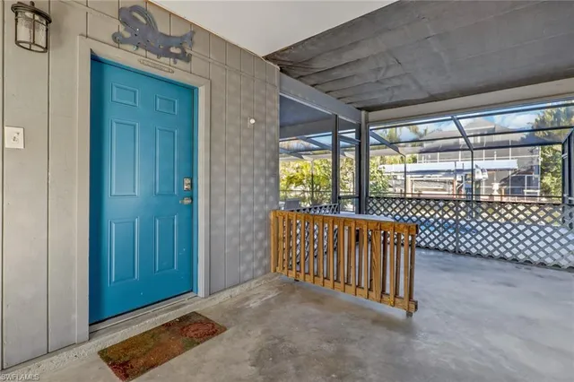 a bathroom with a toilet a sink a vanity and mirror
