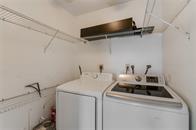 9731 West McNab Road, Unit 208 Tamarac, FL 33321 - Photo 12 of 13 a utility room with dryer and washer
