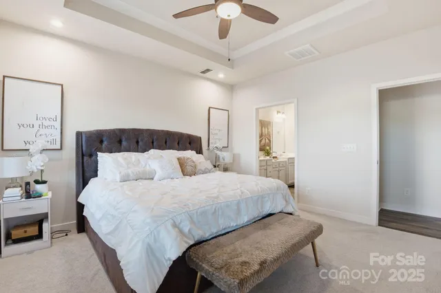 a bathroom with a double vanity sink and mirror