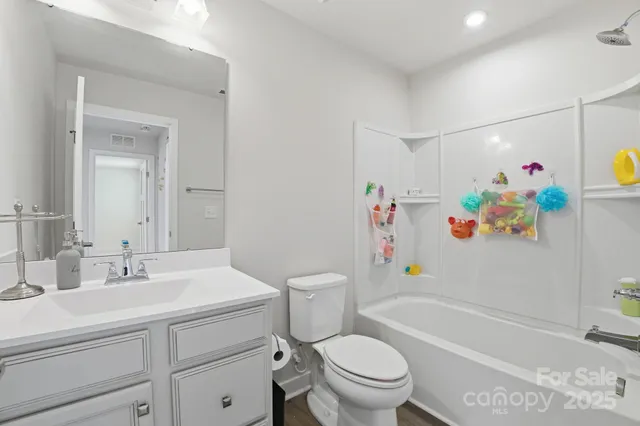 a view of kids room with toys and toys