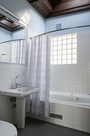 a bathroom with a sink and a bathtub