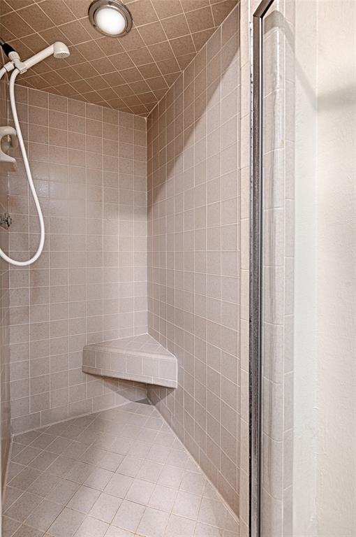10757 Villager Road, Unit D Dallas, TX 75230 - Photo 19 of 21 a bathroom with a shower