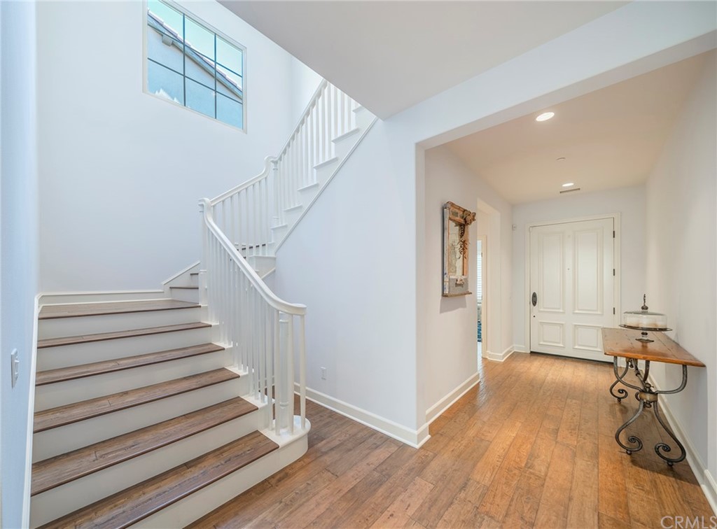 71 Como Irvine, CA 92618 - Photo 14 of 45 a view of entryway and hall with wooden floor