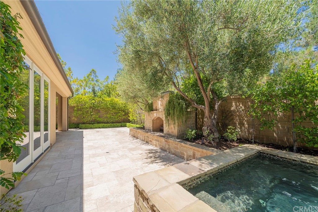 71 Como Irvine, CA 92618 - Photo 37 of 45 a backyard of a house with large trees and plants