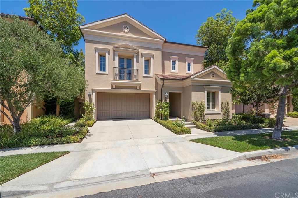 71 Como Irvine, CA 92618 - Photo 40 of 45 a front view of a house with a yard and trees