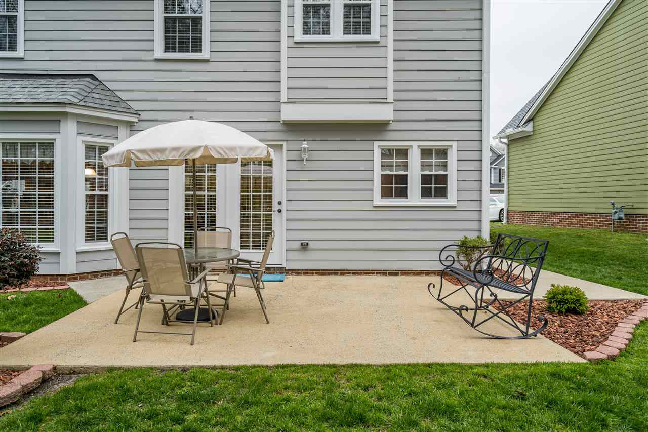 5213 Denmead Way Raleigh, NC 27613 - Photo 23 of 25 a white bench sitting in front of a house