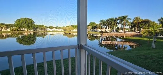 a bathroom with a toilet a sink and a mirror