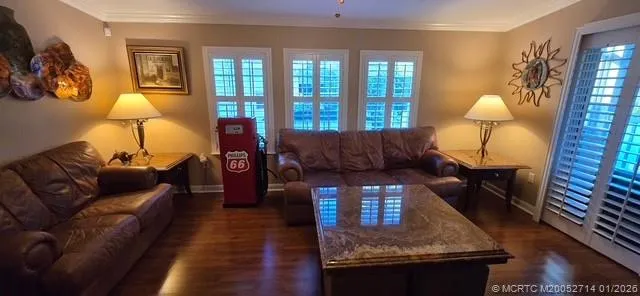 a view of a lake with houses in back