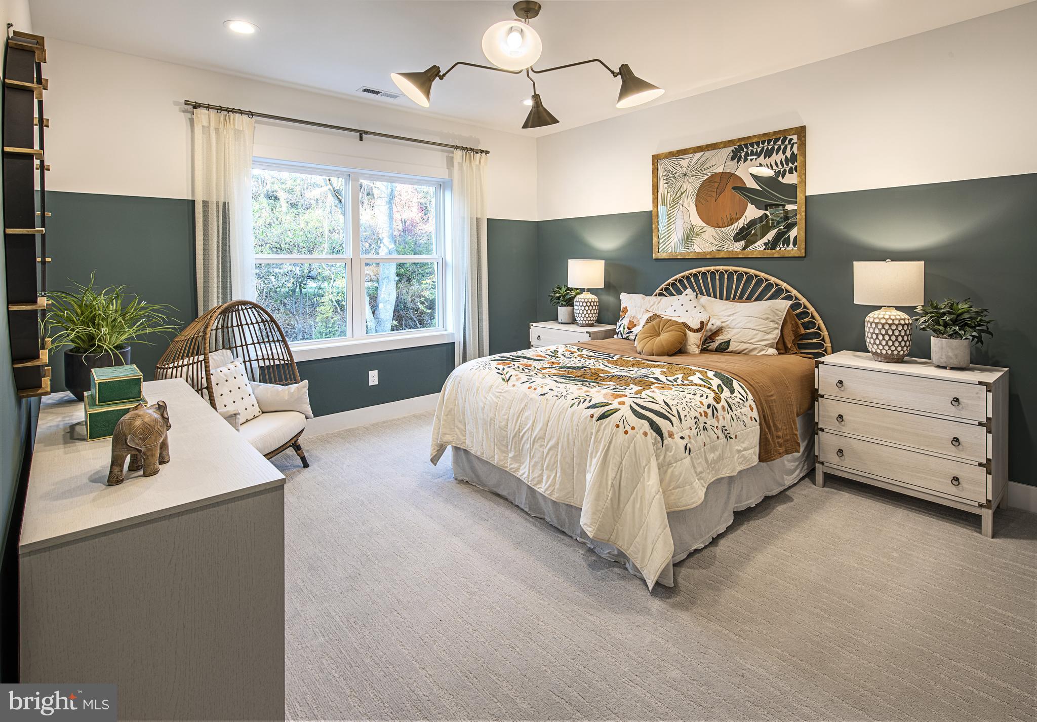 167 Alroy Road, Unit HOMESITE 60 Malvern, PA 19355 - Photo 12 of 20 a bedroom with bed and a large window