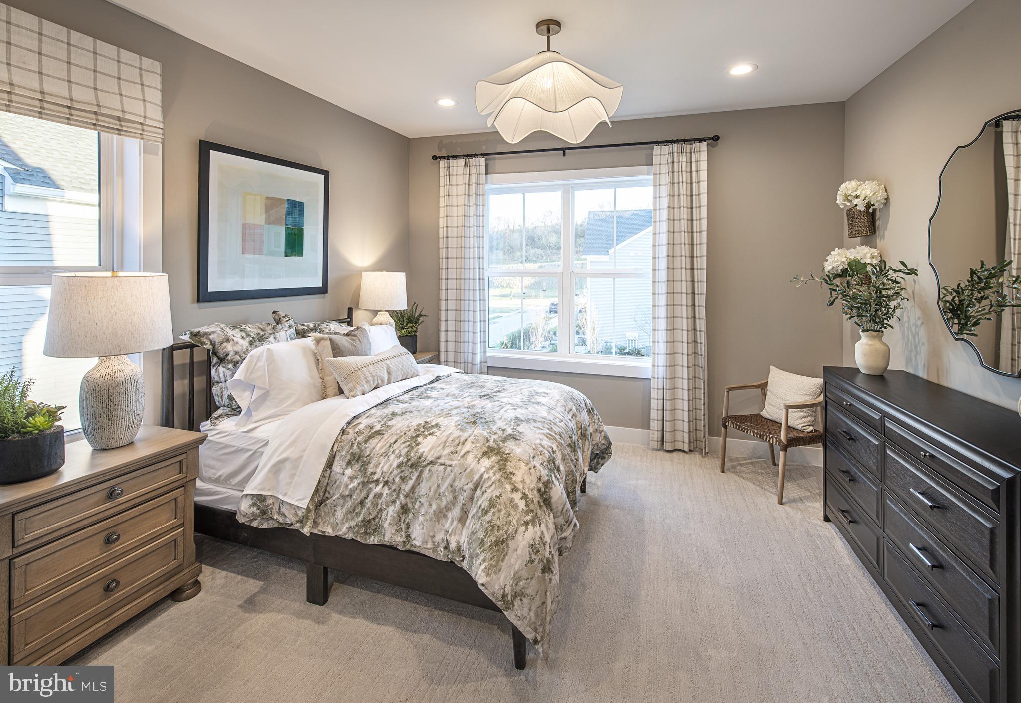 167 Alroy Road, Unit HOMESITE 60 Malvern, PA 19355 - Photo 14 of 20 a spacious bedroom with a bed and a large window