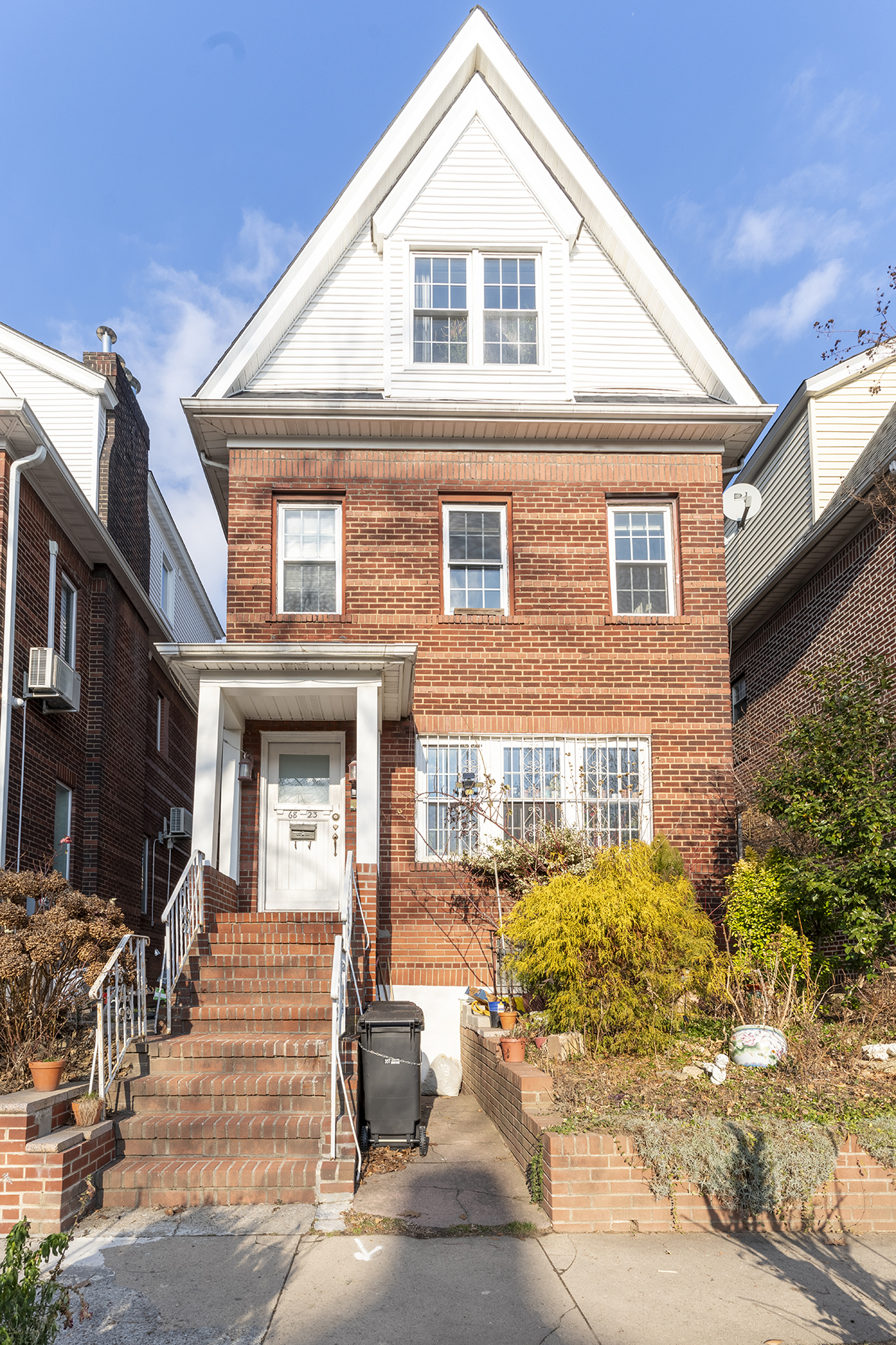 68-23 Exeter Street, Unit 2 Queens, NY 11375 - Photo 14 of 15 a front view of a house