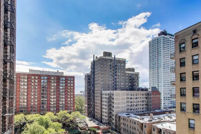 a city view with tall buildings
