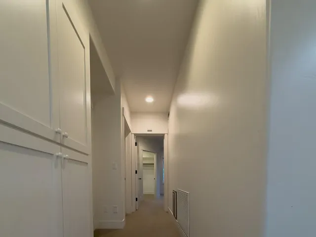 a view of a house with porch and windows