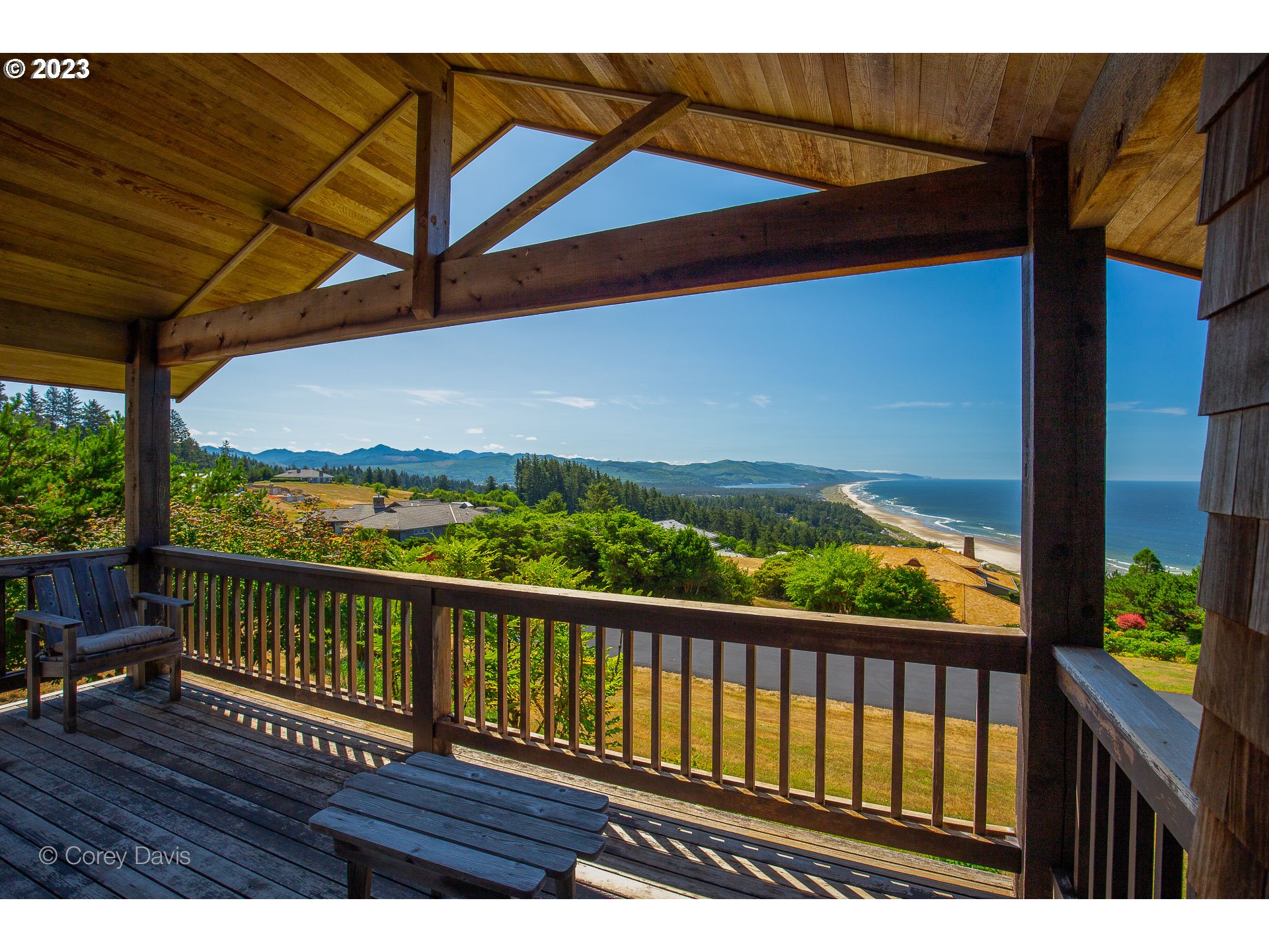 38680 Meadow Loop Nehalem, OR 97131 - Photo 17 of 44 a view of balcony with wooden floor
