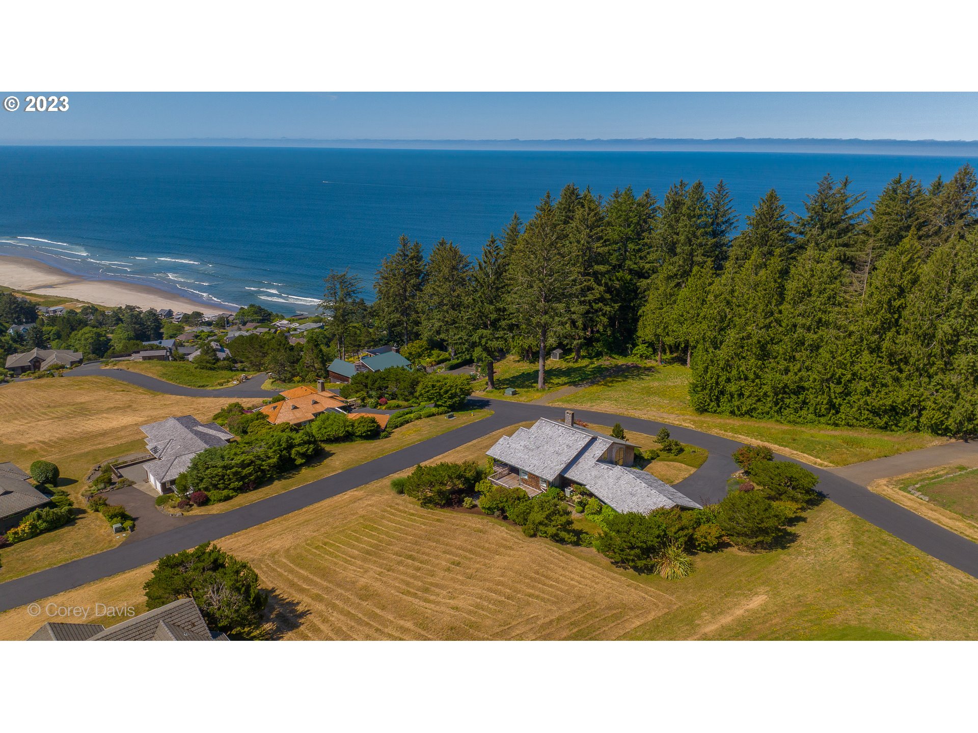 38680 Meadow Loop Nehalem, OR 97131 - Photo 2 of 44 a view of a swimming pool with an outdoor space and seating area